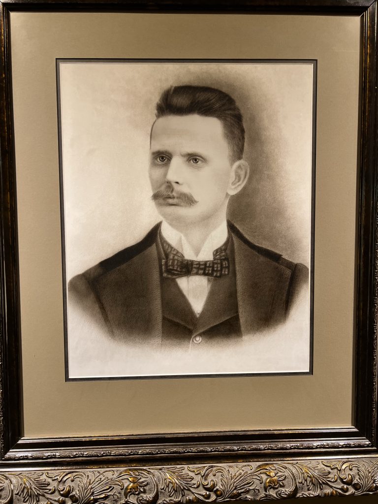 Sepia tone picture of Dr. George E Alexander
